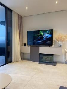 TV a/nebo společenská místnost v ubytování Villa Mediteran Opatija