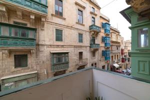 a view from the balcony of a building at JBO- Joette's Bliss Oasis in Valletta