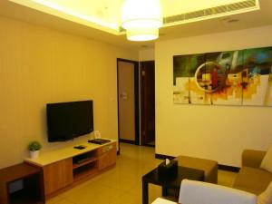 TV a/nebo společenská místnost v ubytování AJ Residence 安捷國際公寓酒店