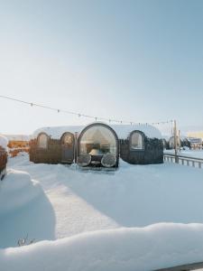 a group of trailers parked in the snow at Iglupark in Tallinn