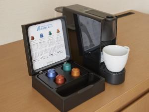 Příslušenství pro přípravu čaje a kávy v ubytování TOKYO EAST SIDE HOTEL KAIE