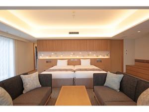 Postel nebo postele na pokoji v ubytování TOKYO EAST SIDE HOTEL KAIE