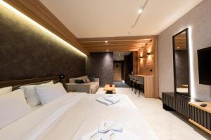 Postel nebo postele na pokoji v ubytování Aparthotel Woodside by Anaya