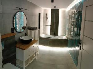 Ванна кімната в Tortuga Apartments II