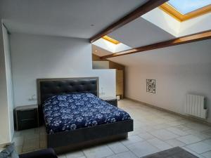 Giường trong phòng chung tại La Grange 3 étoiles - Maison d'hôte à 10 min des plages