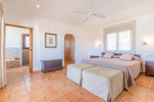 Posteľ alebo postele v izbe v ubytovaní Casa Once Moraira