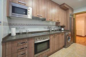 A kitchen or kitchenette at Villa Josechu en Candás