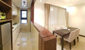 Kuchyň nebo kuchyňský kout v ubytování AJ Residence 安捷國際公寓酒店