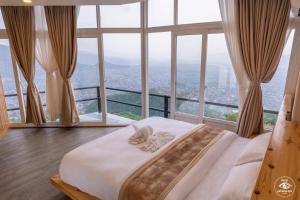 Katil atau katil-katil dalam bilik di Hotel Pokharaeye