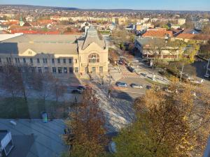 an aerial view of a large building in a city at Sylvis Place in Gödöllő