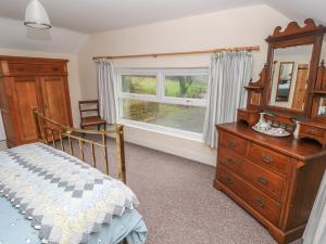 Postel nebo postele na pokoji v ubytování Nash Lodge