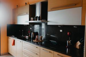 Kuchyňa alebo kuchynka v ubytovaní DimSim Home-Σπίτι με όνομα