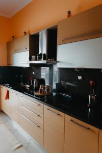 Kuchyňa alebo kuchynka v ubytovaní DimSim Home-Σπίτι με όνομα