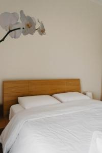 Posteľ alebo postele v izbe v ubytovaní DimSim Home-Σπίτι με όνομα