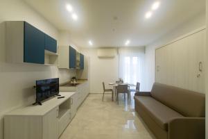TV a/nebo společenská místnost v ubytování Residence Flow-R