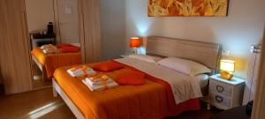Postel nebo postele na pokoji v ubytování B&B LE BACETTE