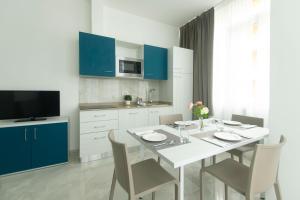 Kuchyň nebo kuchyňský kout v ubytování Residence Flow-R