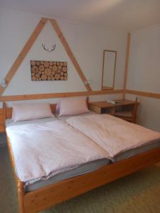 Cama o camas de una habitación en Wald-Landhaus