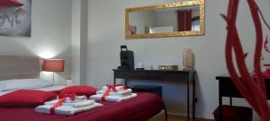 Postel nebo postele na pokoji v ubytování B&B LE BACETTE
