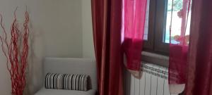 Postel nebo postele na pokoji v ubytování B&B LE BACETTE