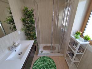 a bathroom with a shower and a sink at Room Dream Beato in Lisbon