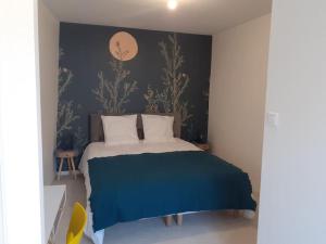 Posteľ alebo postele v izbe v ubytovaní Appartement rénové dans le centre historique