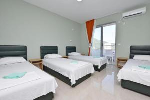 Ένα ή περισσότερα κρεβάτια σε δωμάτιο στο ApartHotel Solaris