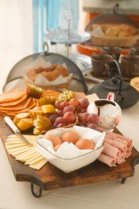 a plate of food with meat and vegetables on a table at Les Jardins de Nicole in La Plaine des Cafres +4 photos