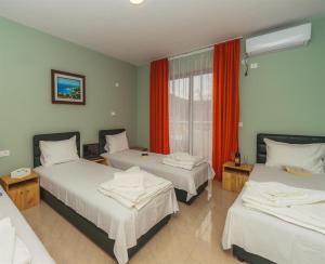 Ένα ή περισσότερα κρεβάτια σε δωμάτιο στο ApartHotel Solaris