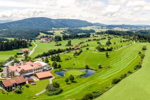 an aerial view of the golf course at a resort at Hanusel Hof in Hellengerst