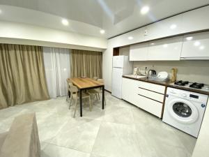 Η κουζίνα ή μικρή κουζίνα στο GSS - B Apartment