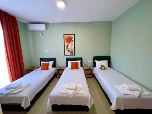 Ένα ή περισσότερα κρεβάτια σε δωμάτιο στο ApartHotel Solaris