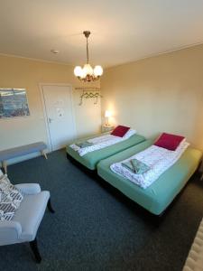 Voodi või voodid majutusasutuse Arsalir Guesthouse Vik B&B toas