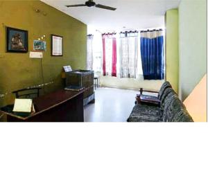Svetainės erdvė apgyvendinimo įstaigoje New Agra Guest House By WB Inn
