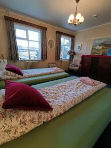 Voodi või voodid majutusasutuse Arsalir Guesthouse Vik B&B toas