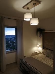 Postel nebo postele na pokoji v ubytování Prima Stella Tourist Rooms