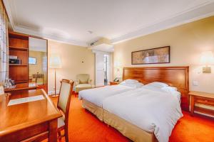 Postel nebo postele na pokoji v ubytování Hotel Moosburger Hof