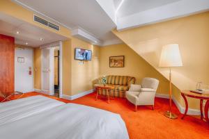 Postel nebo postele na pokoji v ubytování Hotel Moosburger Hof