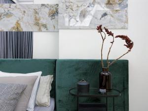 Posteľ alebo postele v izbe v ubytovaní AK Apartments