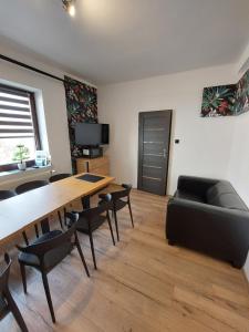 Posezení v ubytování Loft Wisla Houses
