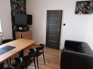 Μια τηλεόραση ή/και κέντρο ψυχαγωγίας στο Loft Wisla Houses