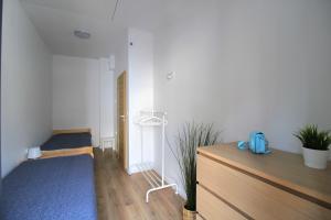 Una cama o camas en una habitación de Apartament MiMi - Dziwnówek Horizon Park , 2 sypialnie i salon
