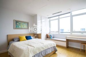 Ένα ή περισσότερα κρεβάτια σε δωμάτιο στο The Rixx Stylish Apartment - Ben Thanh/gym/pool/bar +10 φωτογραφίες