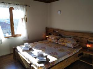 Postel nebo postele na pokoji v ubytování Дидовата къща Didovata Kashta + 22 fotografií