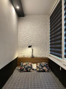Posteľ alebo postele v izbe v ubytovaní Apartament BB na Halnej