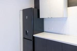 Kuchyň nebo kuchyňský kout v ubytování Apartamento completo a 5 minutos estación tren.