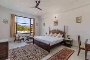 Postel nebo postele na pokoji v ubytování Jass Bagh Home stay Udaipur I swimming pool I wedding I 946o1o3906 + 37 fotografií