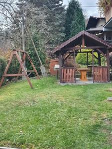Vonkajšia záhrada v ubytovaní Pokoje Gościnne Barbara