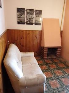 En eller flere senger på et rom på Estadía Don Roque