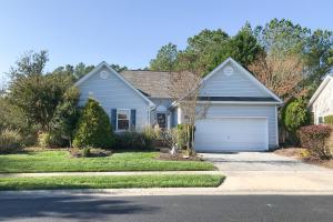una casa azul con un garaje en una calle en Bethany Bay - 37278 Fox Dr, en Ocean View